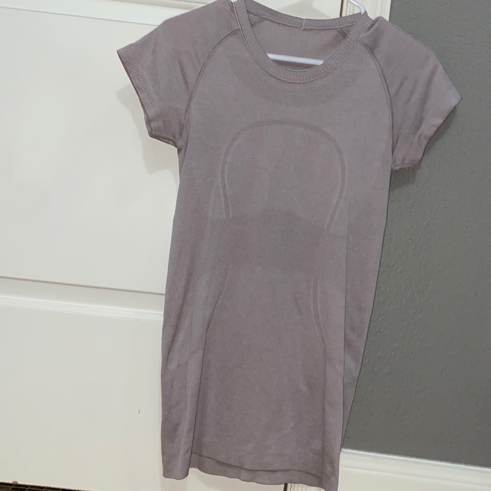 Lululemon light pink/purple swiftly tech shirt Size 6
